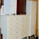 A 3 PIECE MODERN BEDROOM SET COMPRISING SINGLE DOOR UNIT WITH UNDER DRAWERS & A PAIR OF 2 OVER 4