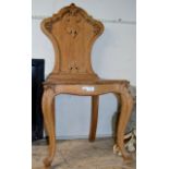 AN OAK GOTHIC STYLE CHAIR