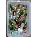 A BOX WITH 100 VARIOUS ALCOHOL MINIATURES