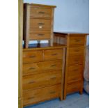 A 3 PIECE MODERN OAK BEDROOM SET COMPRISING 2 OVER 3 CHEST, TALL 6 DRAWER CHEST & 3 DRAWER BEDSIDE