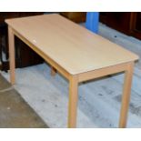 A MODERN BEECH FINISHED WORK TABLE