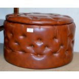 A VINTAGE PADDED LEATHER EFFECT STORAGE FOOT STOOL