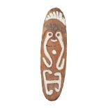 PAPUA NEW GUINEA GULF GOPE BOARD carved wood and pigment, decorated with a mask in red, white and