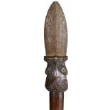 MAORI TAIAHA STAFF carved wood, long tapering shaft terminating in carved Janus tiki with shell eyes