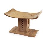 ASANTI STOOL carved wood, standing on a rectangular base, rounded top above supporting column with