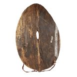 KIKUYU SHIELD carved wood, leaf shaped shield, metal bush repair on the outer face, the reverse with