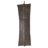 TURKANA METAL SHIELD forged iron, of flared rectangular form and with central supporting wooden pole