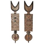 PAIR OF BWA PLANK MASKS carved wood, both with carved and painted geometric decoration, beaks and