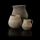 THREE PUEBLO COILED WARE JARS C. 900 - 1300 AD corrugated grey pottery, all decorated with coiled