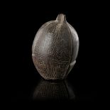 MARIND-ANIM DWARF PENIS COVER carved coconut shell, decorated with lime filled incisions 10.5cm