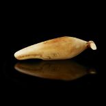 FINE INUIT SPERM WHALE CHARM marine ivory, finely carved with incised decoration and deep caramel