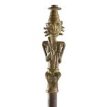 YORUBA OGBONI PARADE STAFF the brass handle in the form of a stylised seated male figure, modelled