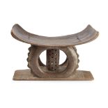 ASANTI STOOL carved wood, rounded top above oval support and column with geometrical openwork