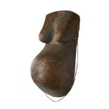 MAKONDE BODY MASK carved wood, modeled in the form of a preganant woman, with scarification marks to