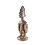 YORUBA IBEJI FIGURE carved wood, male figure with incised domed coiffure and abdominal