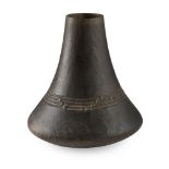 HIMA MILK JUG carved jacaranda wood, bell shaped form with incised banded decoration, dark patina