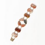 An agate set braceletset with four rectangular agate cabochons joined by belcher links, the