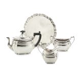 A bachelor's three piece tea setSheffield 1918, comprising teapot, twin handed sugar bowl and milk