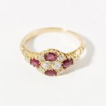 A ruby and diamond set cluster ringset with two old round cut diamonds, in a border of oval cut