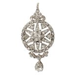 A Victorian diamond set pendantof circular outline with star detail, set throughout with old cushion
