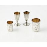 A group of four Russian vodka cupsa pair of vase shaped goblet form, satin finish, Moscow post 1920,