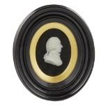 A WEDGWOOD MEDALLION DEPICTING ADAM SMITH AFTER JAMES TASSIE, LATE 18TH CENTURY reserved on a