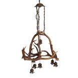 A SCOTTISH ANTLER CHANDELIER CIRCA 1900 formed as an arrangement of antlers and suspending seven