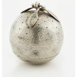 A silver and parcel gilt pomanderJames Samuel Bell, London 1911, modelled as a fruit, simple leaf