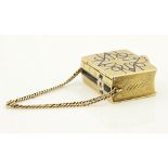 A mid 19th century gold lockettests as gold apparently unmarked, modelled as a book with an