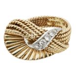 A 18ct gold mid-century diamond set ring, Kutchinskyof scrolling fan design, set with a single row