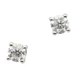 A pair of diamond set stud earringseach claw set with a round brilliant-cut diamond, to post and