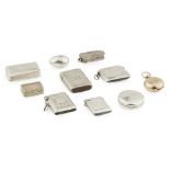 A group of silver snuff, vesta, vinaigrettes and other boxes to includefour various vesta cases,