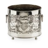 GLASGOW SCHOOL REPOUSSÉ METAL CACHE POT, CIRCA 1910 of cylindrical form with ring handles, decorated