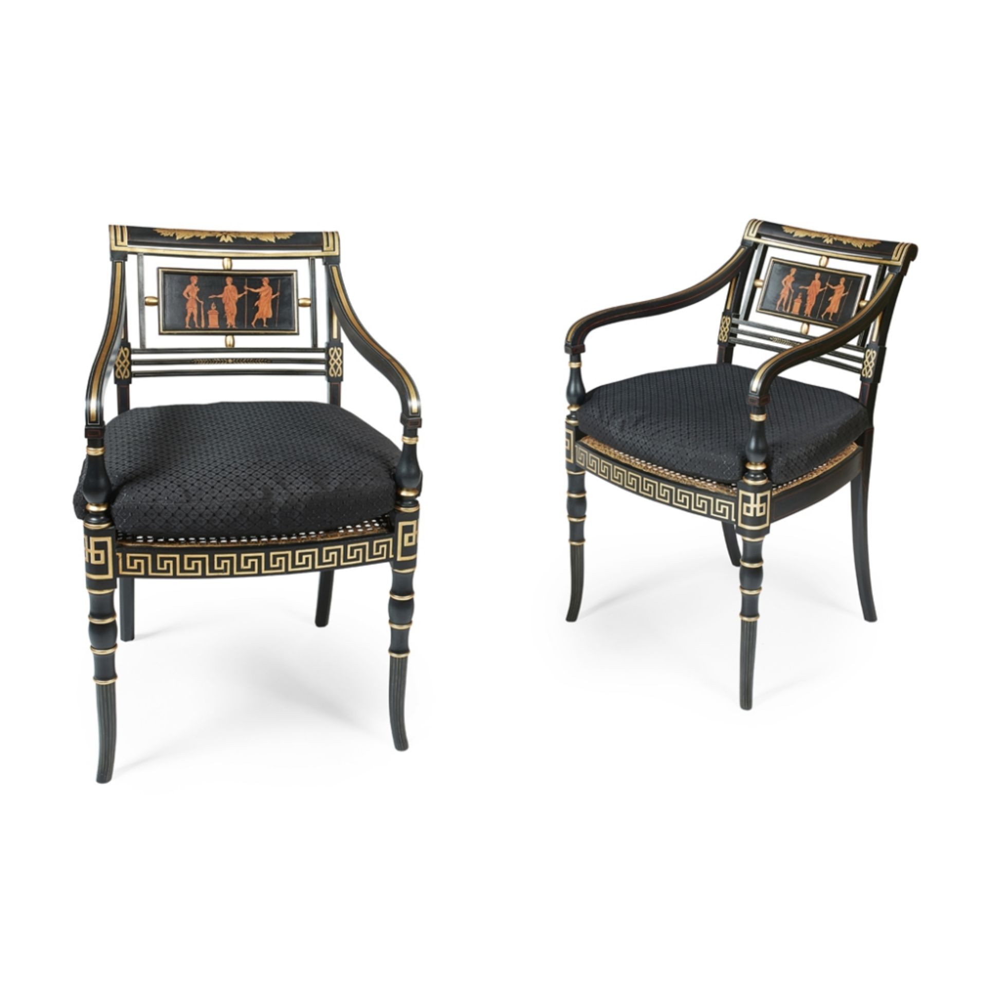 SET OF FOUR REGENCY STYLE EBONISED AND GILT OPEN ARMCHAIRS 20TH CENTURY with curved backs above