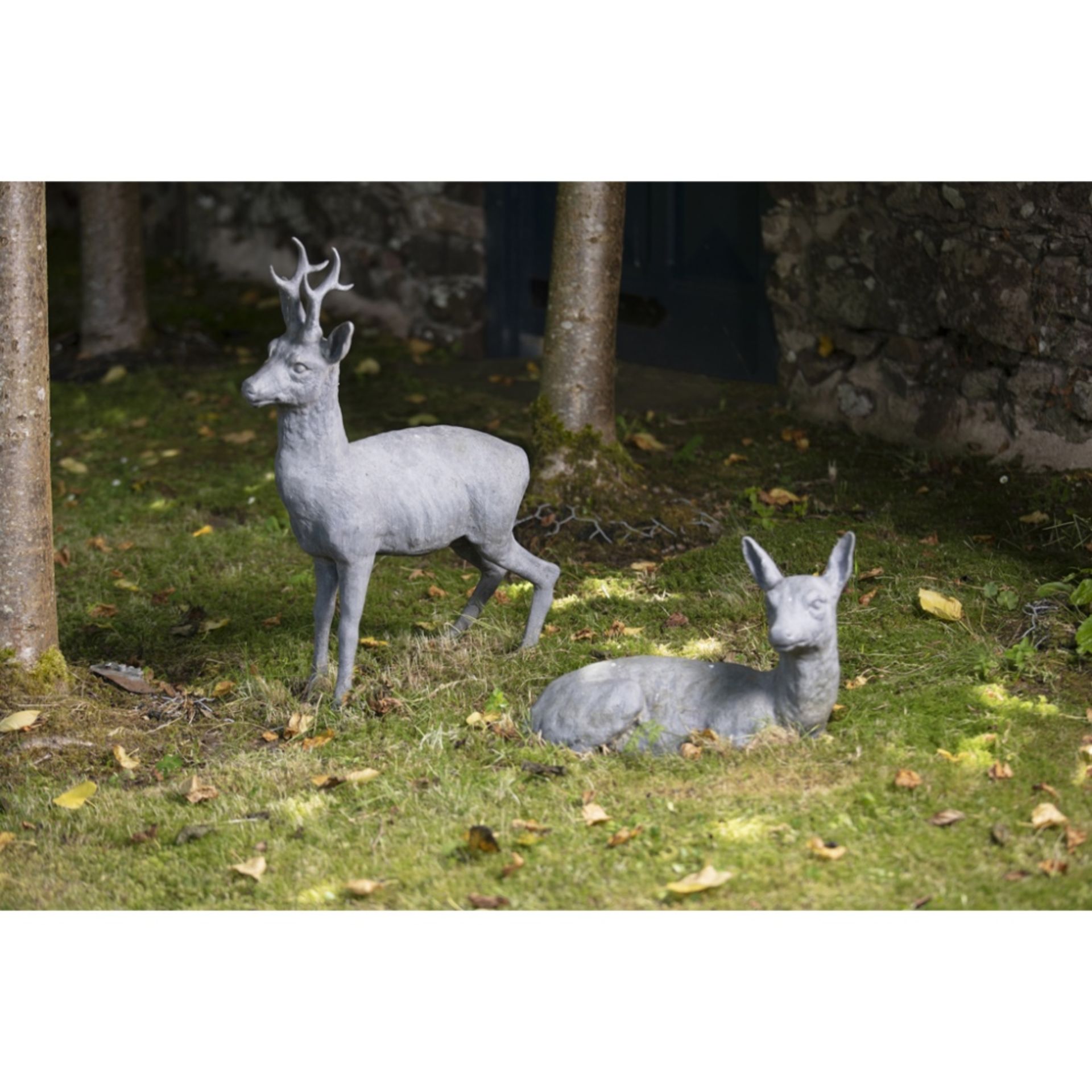 H. CROWTHER, LONDON PAIR OF LEAD GARDEN FIGURES, MODERN depicting a stag and a doe, naturalistically