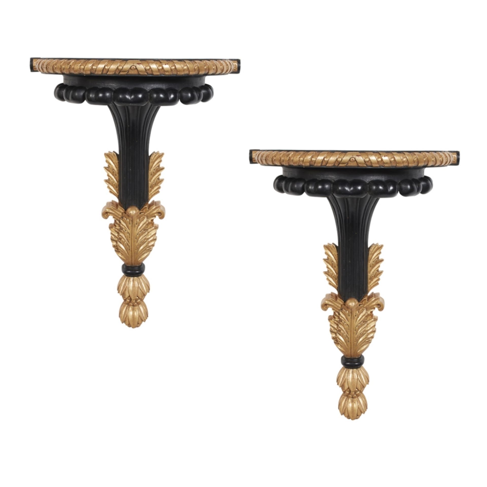 PAIR OF REGENCY STYLE EBONISED AND GILTWOOD WALL BRACKETS MODERN with demi-lune platforms and carved