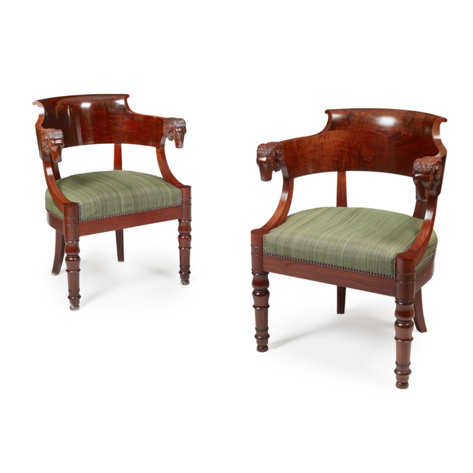 PAIR OF EMPIRE STYLE MAHOGANY OPEN ARMCHAIRS 20TH CENTURY the shaped backs terminating in carved