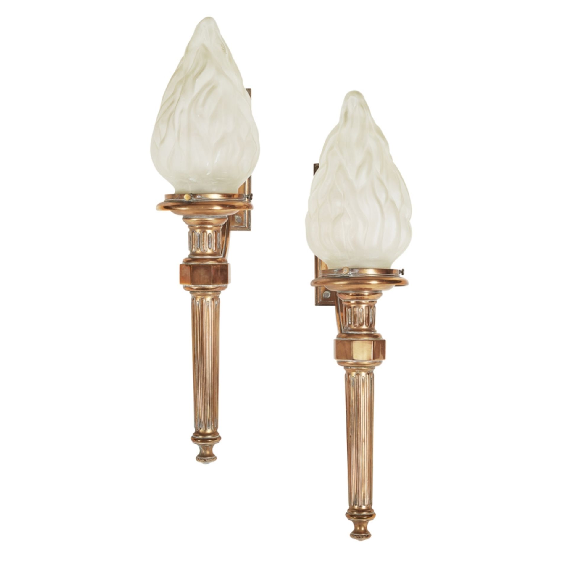 ENGLISH SCHOOL PAIR OF BRASS WALL LIGHTS, CIRCA 1920 each cast as reeded torches with frosted