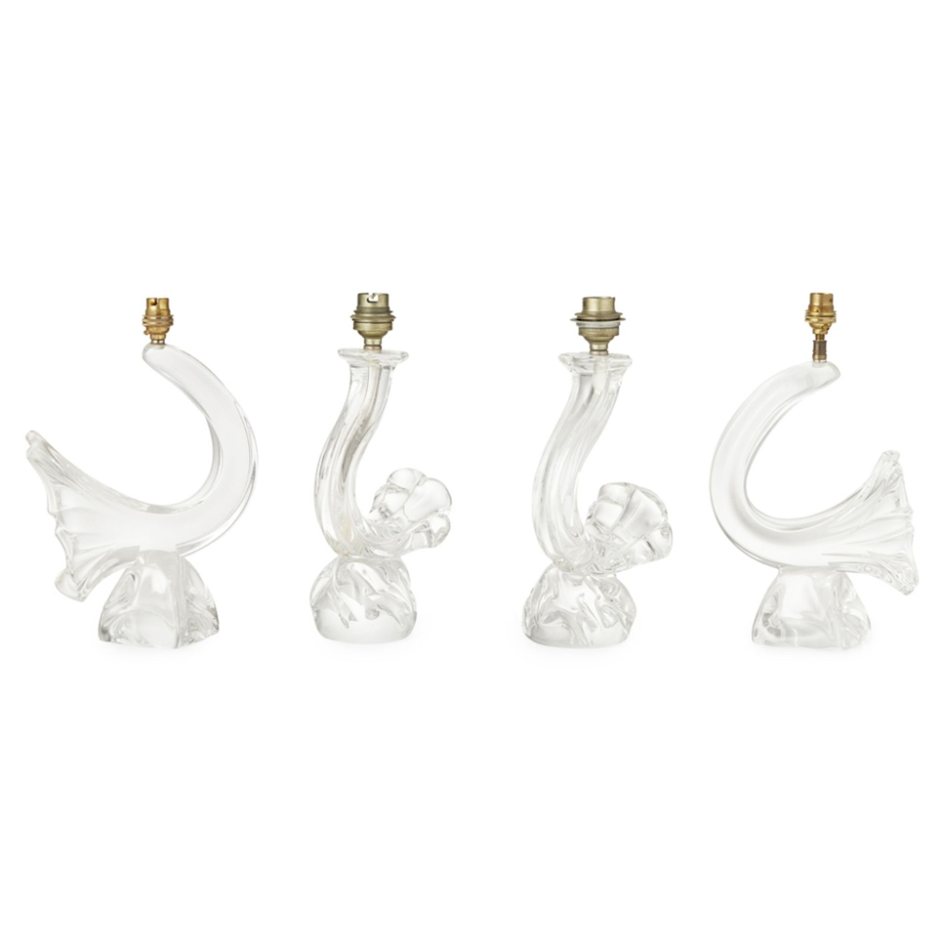 DAUM, FRANCE GROUP OF FOUR CLEAR GLASS LAMP BASES, LATE 20TH CENTURY each of freeform style,