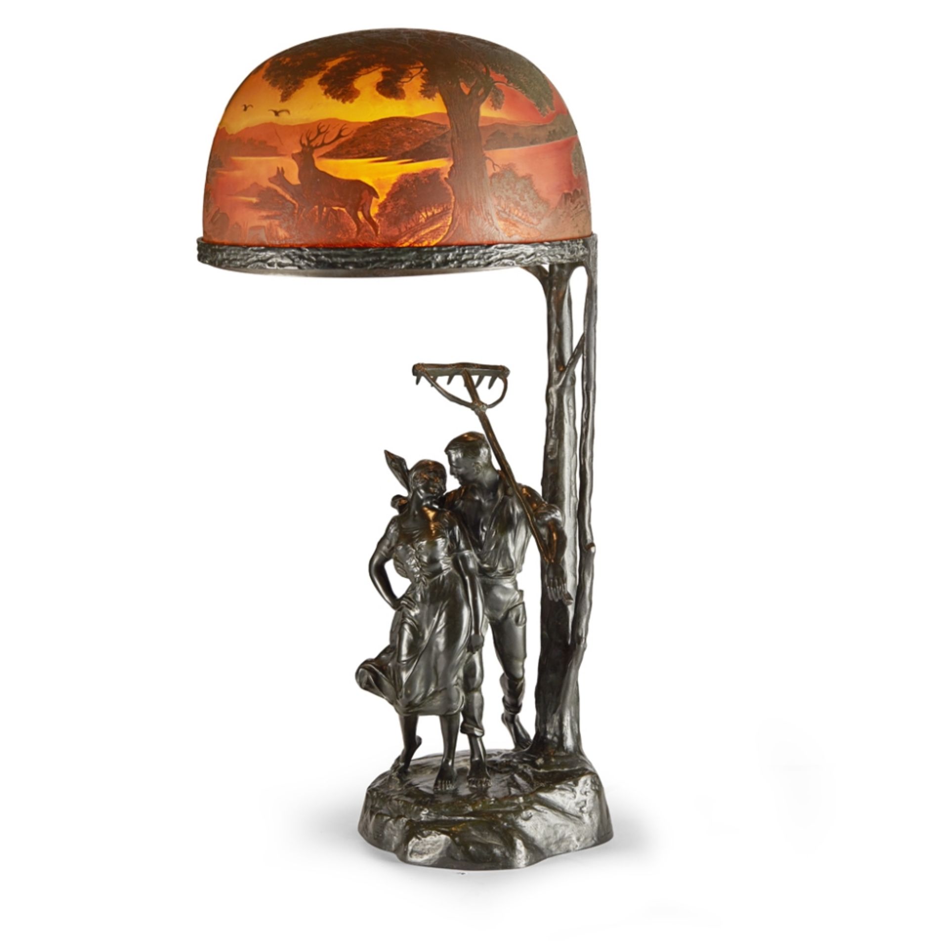 BRUNO ZACH (1891-1935) PATINATED BRONZE AND CAMEO GLASS TABLE LAMP, CIRCA 1910 the base cast as a