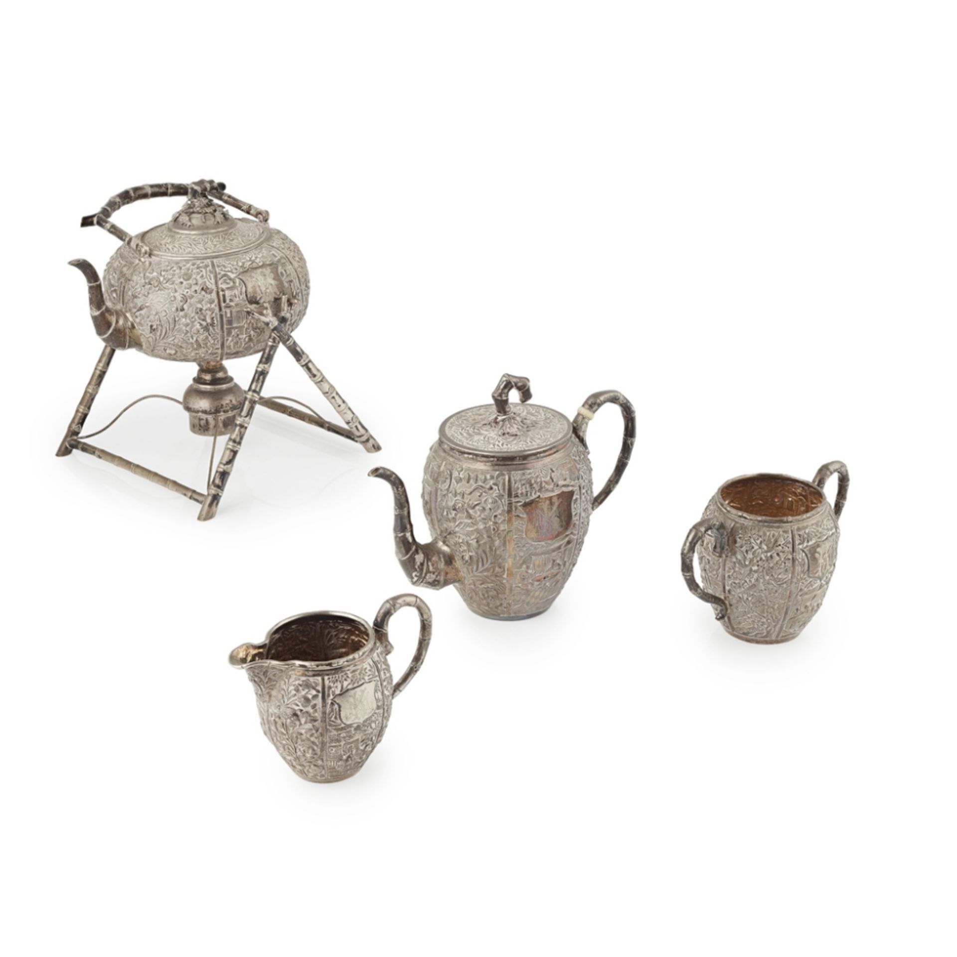 FOUR-PIECE SILVER TEA SETDE CHANG AND C.S. MARKS, 19TH CENTURY comprising: a compressed globular