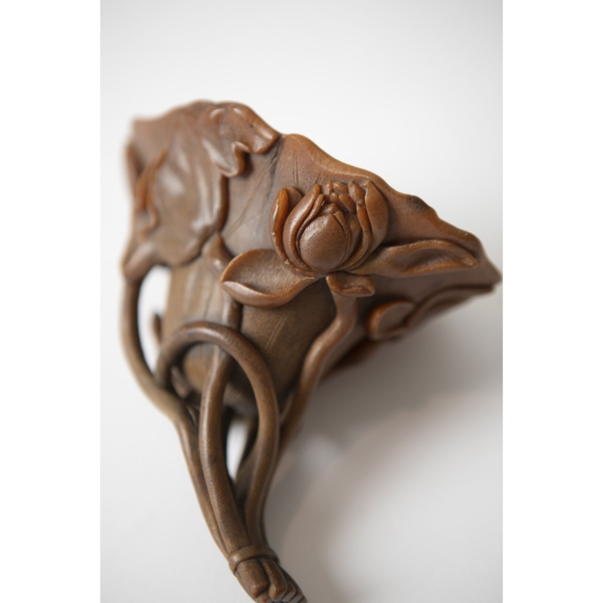 RARE WELL-CARVED RHINOCEROS HORN 'LOTUS' LIBATION CUPQING DYNASTY, 17TH CENTURY carved following the - Image 2 of 5