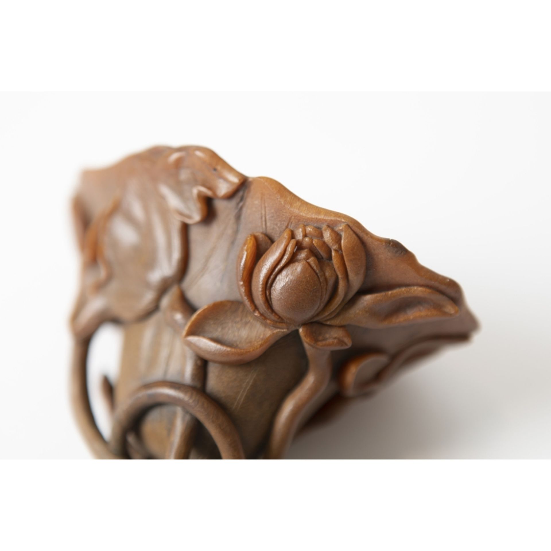 RARE WELL-CARVED RHINOCEROS HORN 'LOTUS' LIBATION CUPQING DYNASTY, 17TH CENTURY carved following the - Image 4 of 5