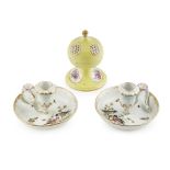 THREE GERMAN PORCELAIN WARES19TH CENTURY comprising a pair of Meissen chambersticks, decorated