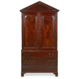 EARLY GEORGE III MAHOGANY BOOKCASE CABINETMID 18TH CENTURY of neat size, the dentil moulded pediment