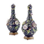 LARGE PAIR OF COALBROOKDALE STYLE PORCELAIN BOTTLE VASES19TH CENTURY profusely decorated with