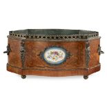 FRENCH KINGWOOD, MARQUETRY, AND PORCELAIN MOUNTED JARDINIERE19TH CENTURY of shaped serpentine