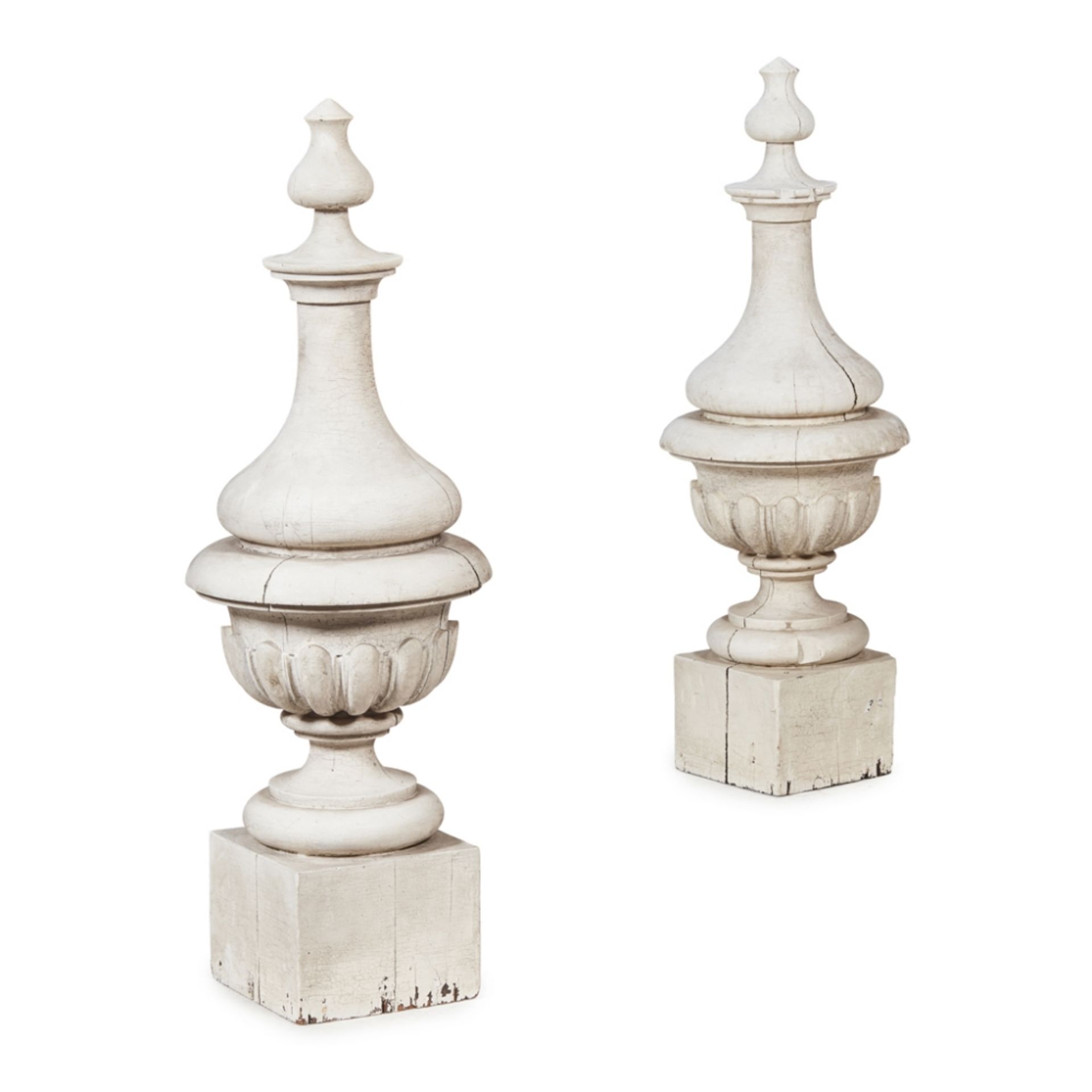 PAIR OF PAINTED WOOD FINIALS19TH CENTURY of urn form with reeded bodies on square bases, painted