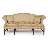 GEORGE III STYLE MAHOGANY FRAME CAMEL BACK SOFA20TH CENTURY the arched back and high scroll arms