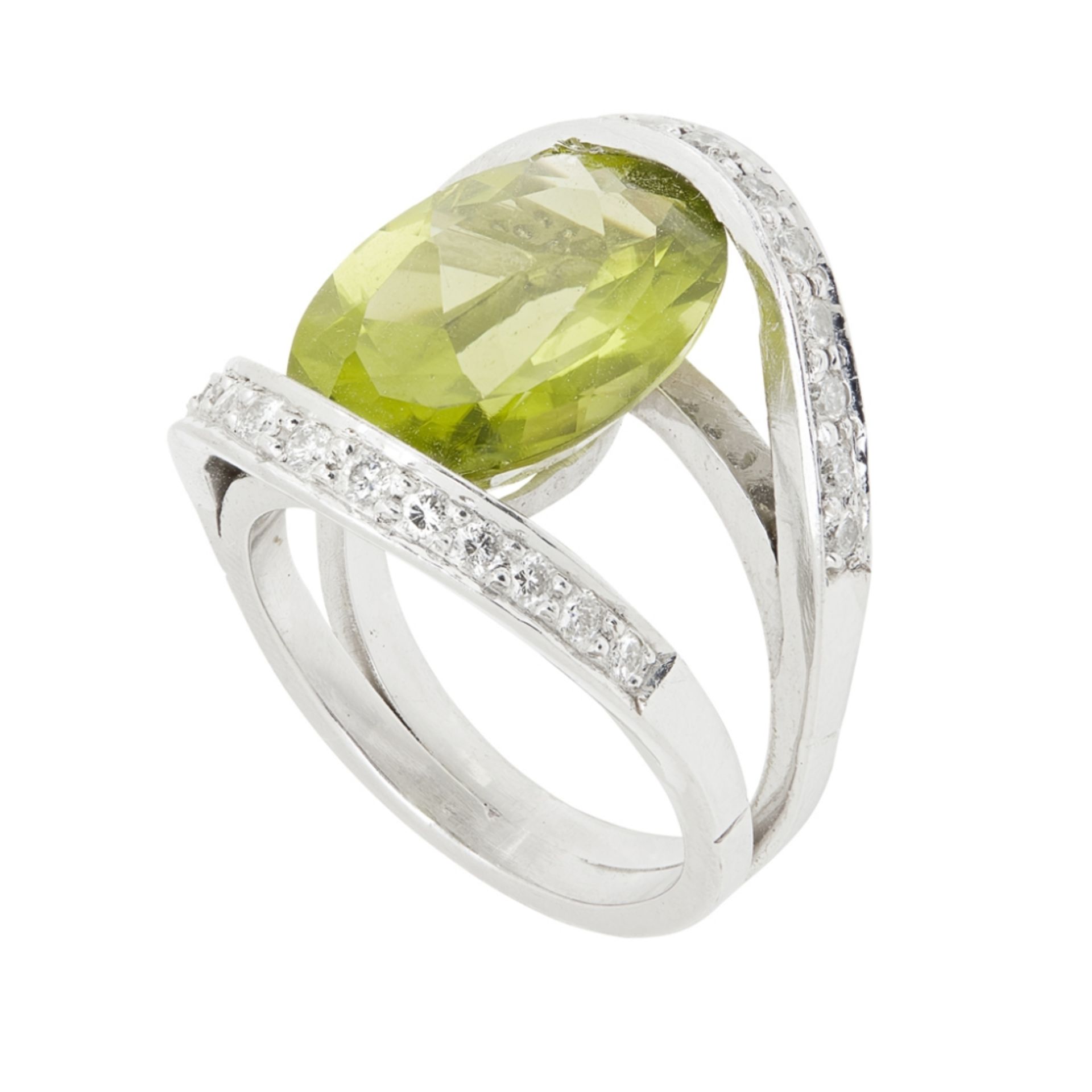 A peridot and diamond set cluster ringset with an oval mixed cut peridot between two rows of small